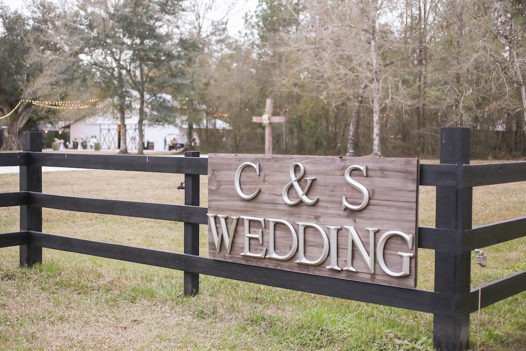 Rustic Wooden Sign with Bride and Groom Initial Wedding Sign | Tampa Bay Wedding Photographer Lifelong Photography Studios | Florida Wedding Venue The White Barn