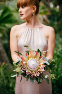 Tampa Bay Bridesmaid in Blush Dress with King Protea and Greenery Flower Bouquet | Sarasota Wedding Planner NK Weddings