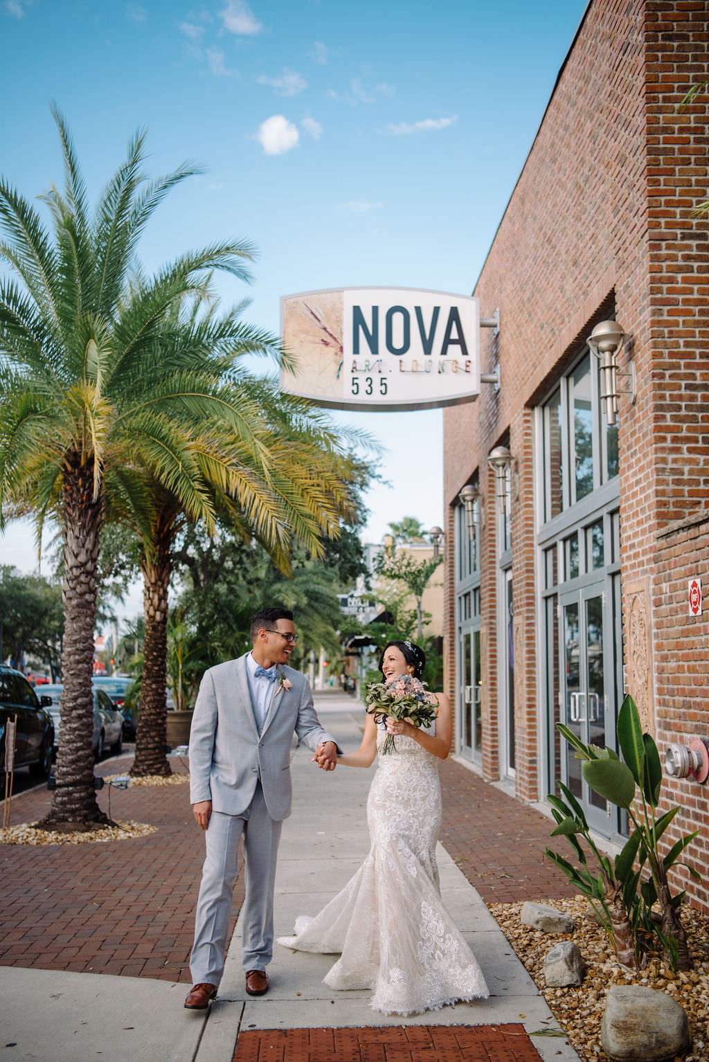 Bride and groom at downtown St. Pete wedding NOVA 535 | Tampa Bay Wedding Photographer Kera Photography