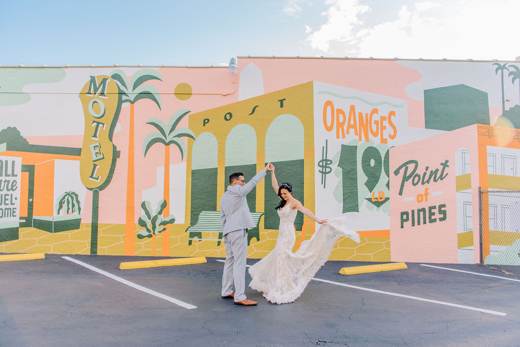 Downtown St. Pete wedding portraits in front of colorful graffiti mural by J&S Signs Shine Mural 2018 Tampa Bay Wedding Photographer Kera Photography