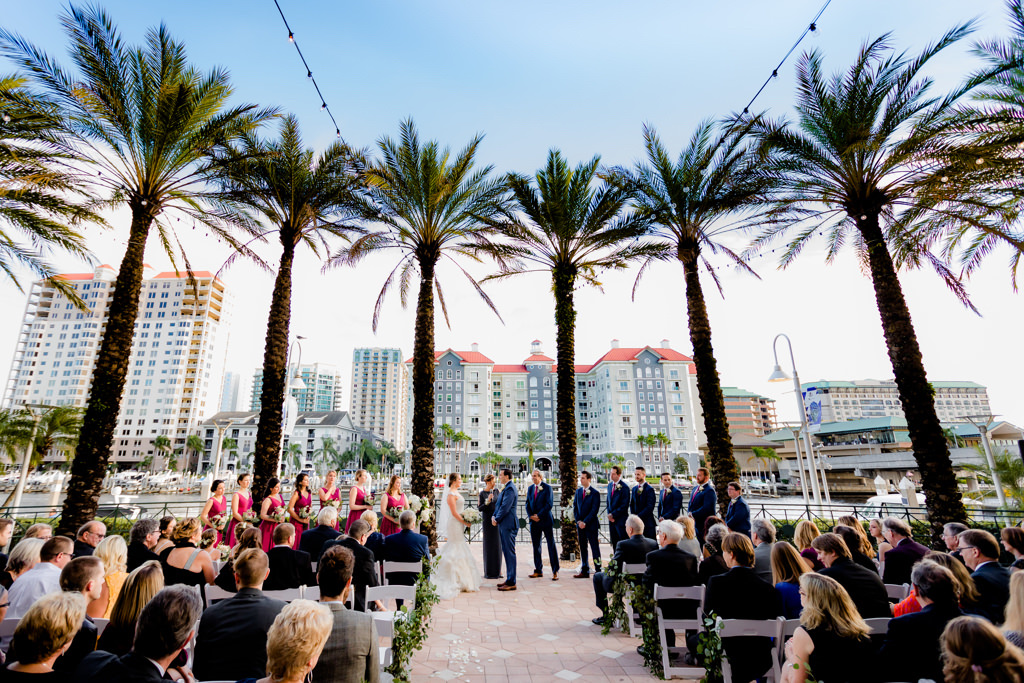 Tampa Bay Bride and Groom Exchanging Vows Waterfront Wedding Ceremony Portrait | Wedding Venue Tampa Marriott Water Street | Planner Special Moments Event Planning