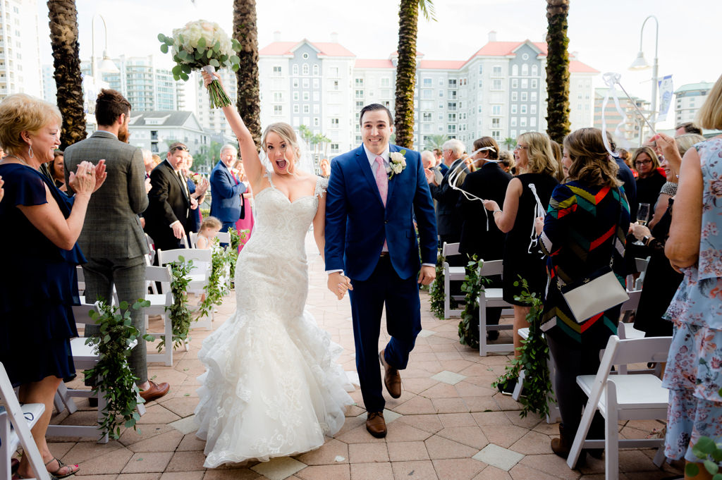 Tampa Bay Bride and Groom Wedding Ceremony Exit Portrait | Wedding Venue Tampa Marriott Waterside
