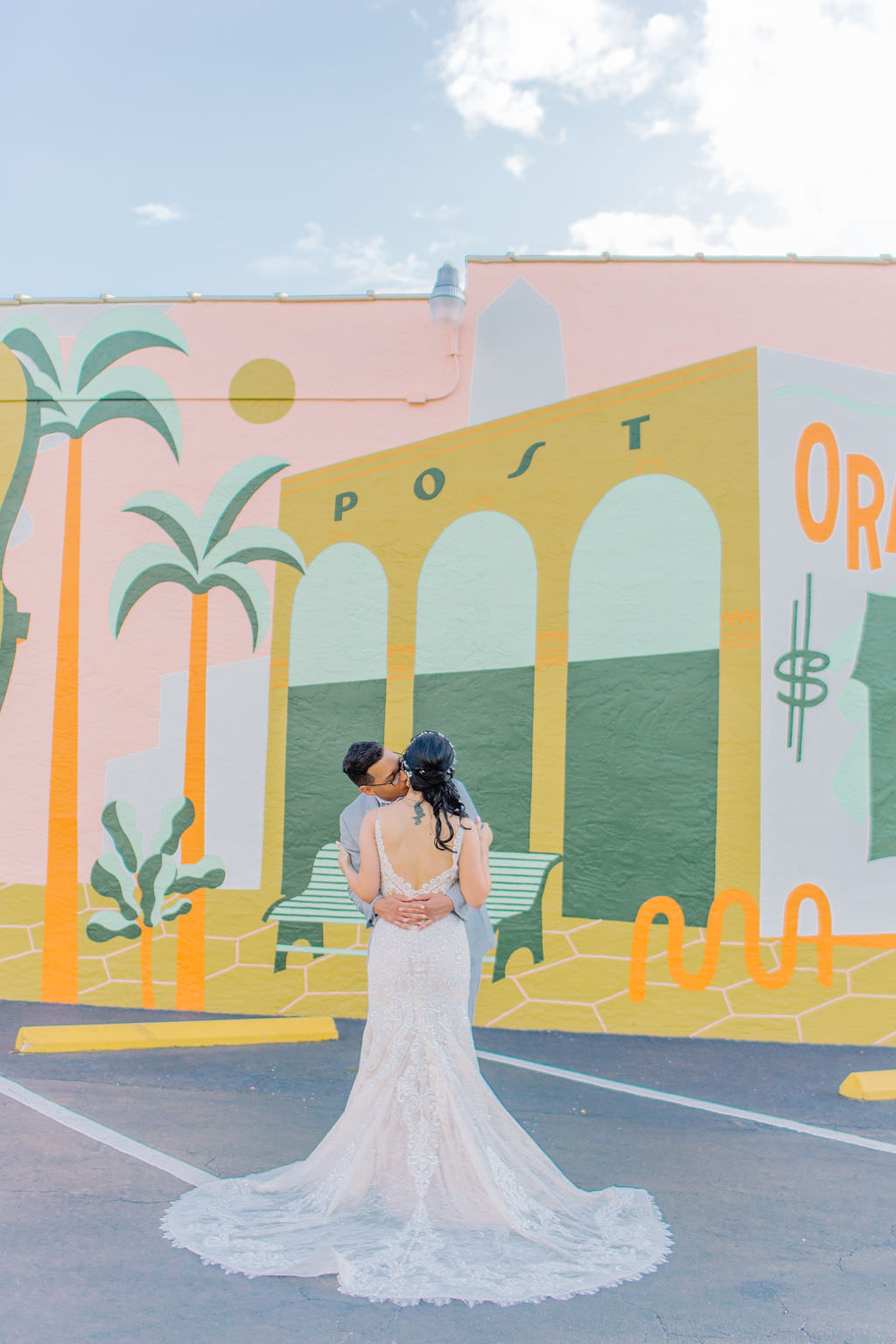 Downtown St. Pete wedding portraits in front of colorful graffiti mural | Tampa Bay Wedding Photographer Kera Photography