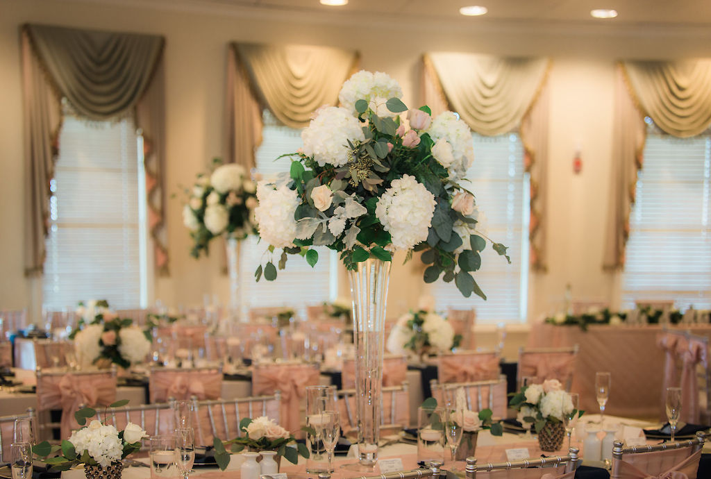 Elegant Ballroom Wedding Reception Decor, Tall Glass Cylinder Vase with White Hydrangeas, Dusty Miller, Blush Pink and Ivory Roses and Silver Dollar Eucalyptus Greenery Leaves Flower Centerpiece