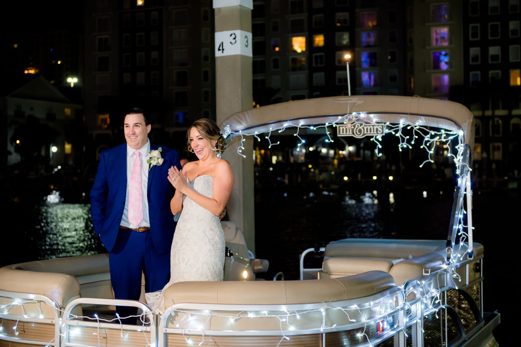 Tampa Bay Bride and Groom Wedding Exit on Pontoon Boat | Florida Bride and Groom Wedding Sparkler Exit | Downtown Venue Tampa Marriott Water Street | Wedding Planner Special Moments Event Planning