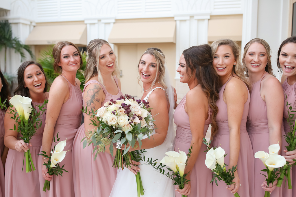 Florida Bride and Bridesmaids Wedding Portrait, Bridesmaids in Mauve Matching Long Dresses with Halter Top and White Calla Lillies, Bride with Organic Ivory, Deep Purple and Greenery Flower Bouquet | Tampa Bay Wedding Photographer Lifelong Photography Studios