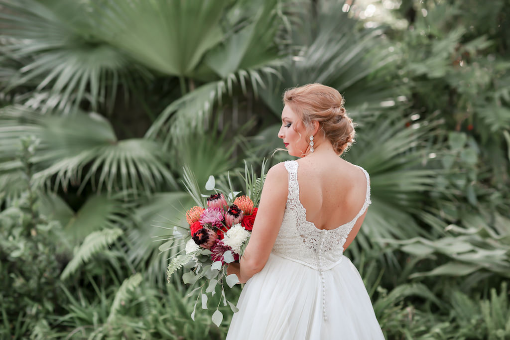Florida Bride Outdoor Wedding Portrait with Tropical Floral Bouquet, Low Back Lace and Illusion Ballgown Wedding Dress | Tampa Bay Wedding Photographer Lifelong Photography Studio | Hair and Makeup Michele Renee the Studio