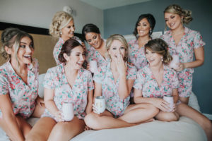 Florida Bride and Bridesmaids Getting Ready Wedding Portrait in Pink Floral Robes