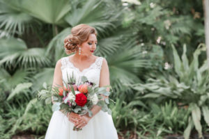 Florida Bride Outdoor Wedding Portrait with Tropical Red, White, Orange, Pink, Greenery Floral Bouquet, Low Back Lace and Illusion Ballgown with Tank Top Straps Wedding Dress | Tampa Bay Wedding Photographer Lifelong Photography Studio | Hair and Makeup Michele Renee the Studio