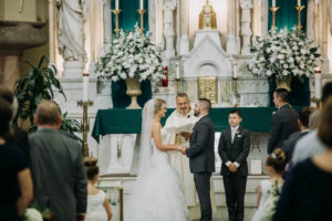 Traditional Bride and Groom Wedding Ceremony Exchanging Vows Portrait | Tampa Bay Wedding Venue Sacred Heart Catholic Church