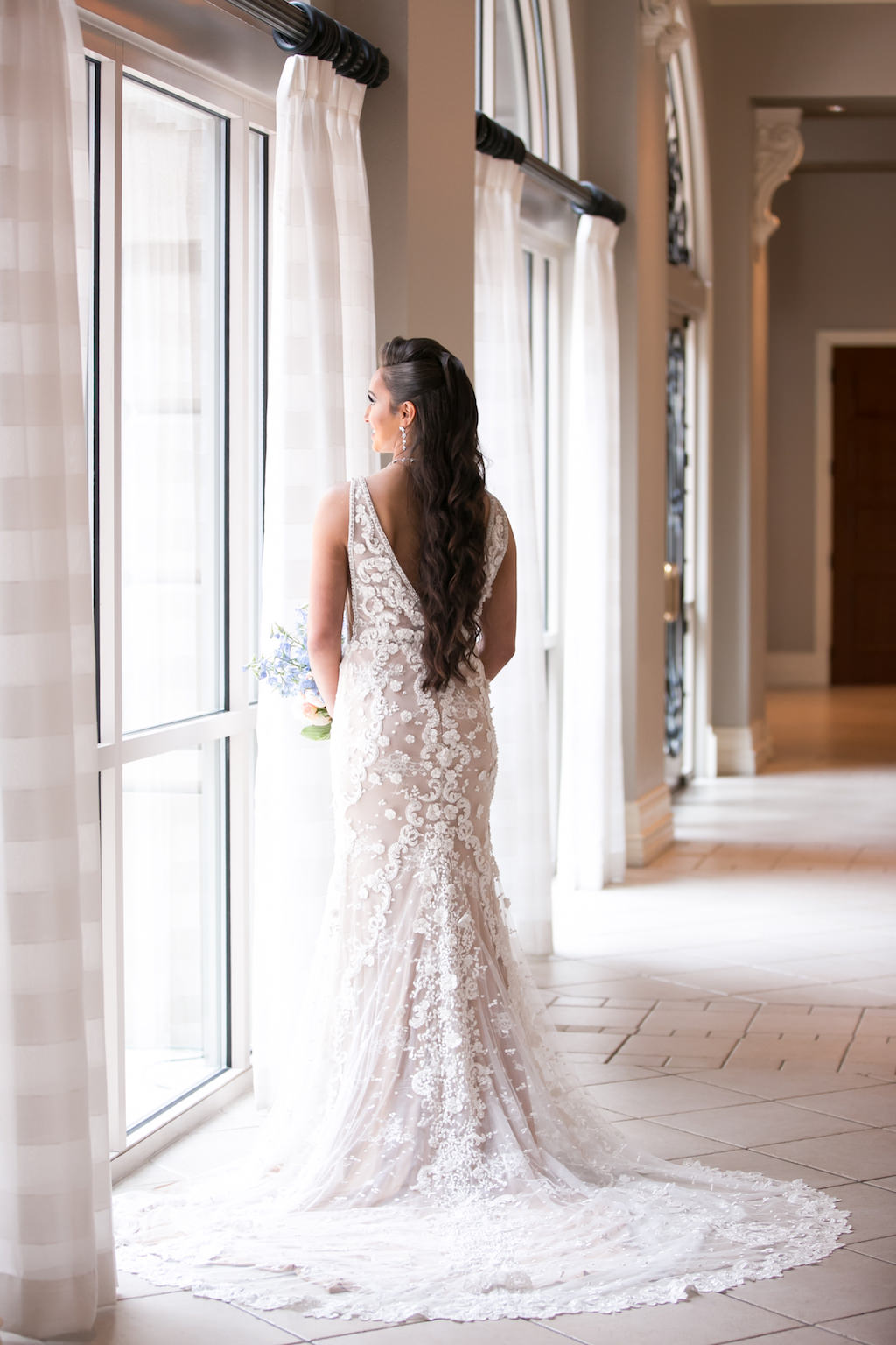 Tampa Bay Bride Wedding Portrait in Lace and Illusions V Shaped Open Back and Tank Top Straps Wedding Dress | Tampa Bay Photographer Carrie Wildes Photography | Hair and Makeup Destiny and Light Hair and Makeup Group | Wedding Dress Nikkk's Glitz and Glam Boutique | Wedding Venue Renaissance Tampa International Plaza