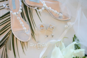 Silver and Pearl Strap Sandal Wedding Shoes, Bride Engagement Ring and Wedding Ring in Velvet Ring Box, Pearl Hair Accessory | St. Pete Wedding Photographer LifeLong Photography Studios