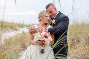 Beachfront St. Pete Bride and Groom Wedding Portrait, Bride with Ivory, White, Pink, and Berry Floral Bouquet | Tampa Bay Wedding Photographer Lifelong Photography Studios