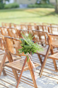 Florida Beach Elegant Wedding Ceremony Decor, Bamboo Wood Folding Chairs with Tropical Palm Leaf Tropical Floral Bouquet | Photographer LifeLong Photography Studios