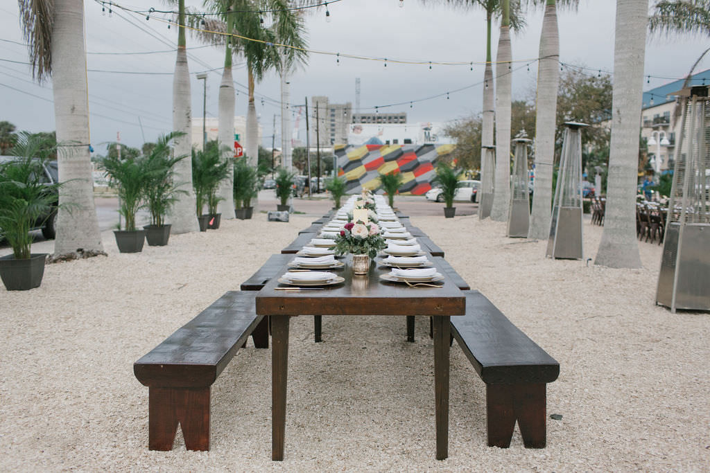 Open Air St. Pete Wedding Reception with Farm Tables and Bench Seating | Outdoor St. Pete Wedding Reception Venue Intermezzo