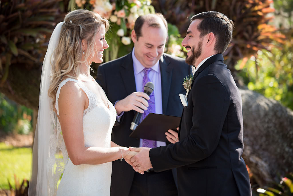 Tampa Bay Bride and Groom Exchanging Vows at Romantic Garden Outdoor Wedding Ceremony