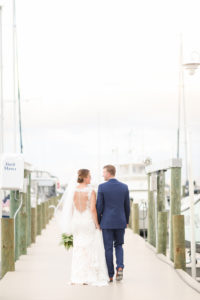 Tampa Bay Bride and Groom Yacht Pier Wedding Portrait | Photographer LifeLong Photography Studios | St. Pete Beach Waterfront Wedding Venue Isla Del Sol Yacht and Country Club