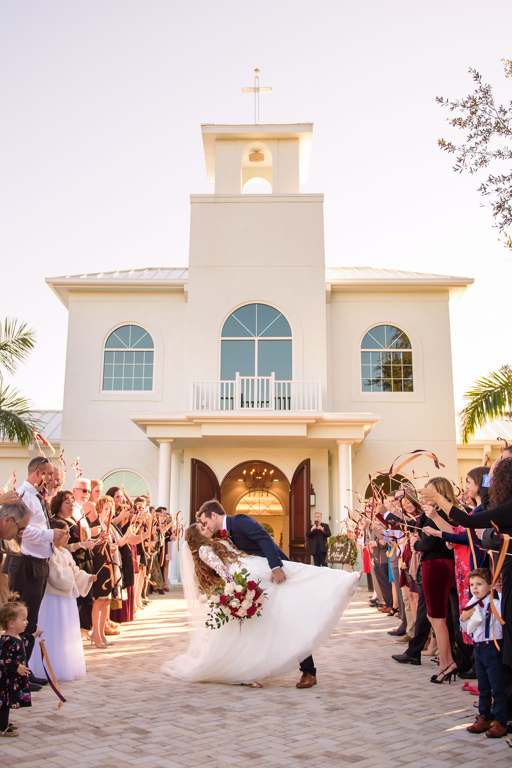 Florida Bride and Groom Wedding Ceremony Exit Portrait | Safety Harbor Wedding Venue Harborside Chapel