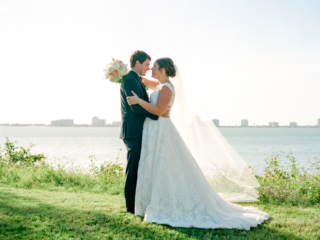 Outdoor Waterfront Tampa Bay Bride and Groom Wedding Portrait | Country Club Wedding Venue Belleair Country Club