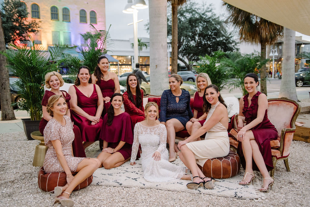 Outdoor Informal Bridal Party Wedding Portrait | Outdoor Wedding Reception Seating Area with Vintage Arm Chairs and Velvet Sofa | Outdoor St. Pete Wedding Reception Venue Intermezzo | St. Pete Wedding Photographer Kera Photography