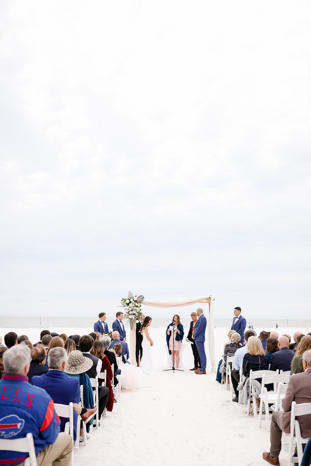 Bride and Groom Destination Florida Wedding Ceremony Beachfront Portrait | Hotel Wedding Venue The Hilton Clearwater Beach Resort & Spa | Photographer Lifelong Photography Studios