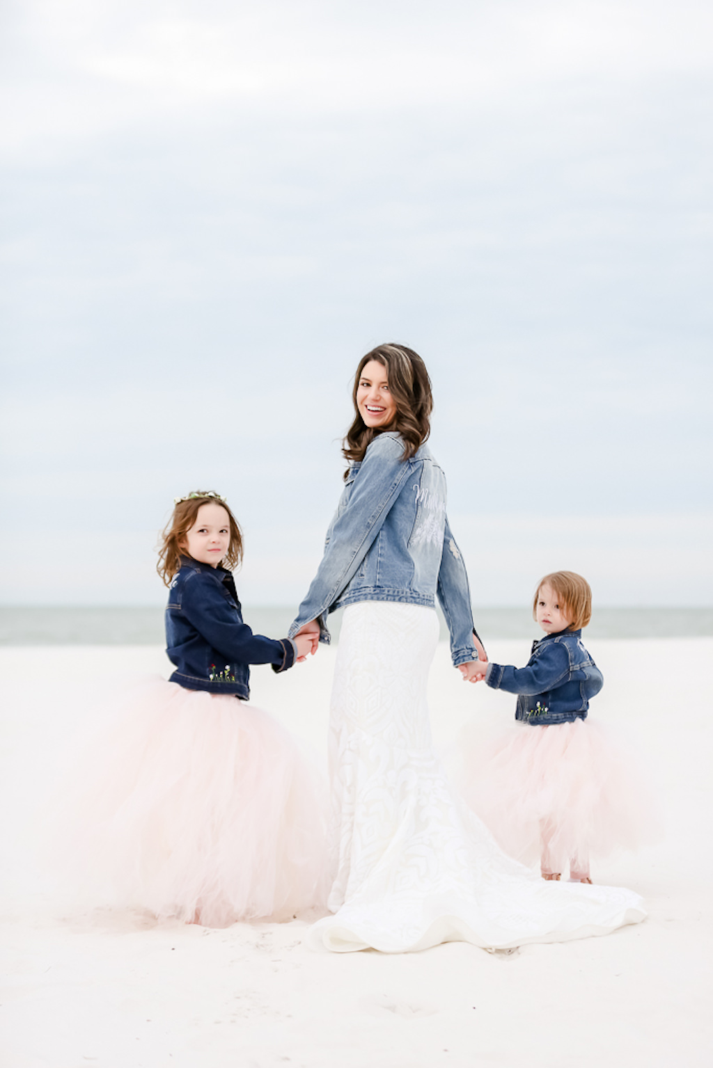 Clearwater Beach Bride and Flower Girls Wedding Portrait, in Custom Jean Jackets with Blush Pink Tulle Skirts | Photographer Lifelong Photography Studios | Hair and Makeup Michele Renee The Studio