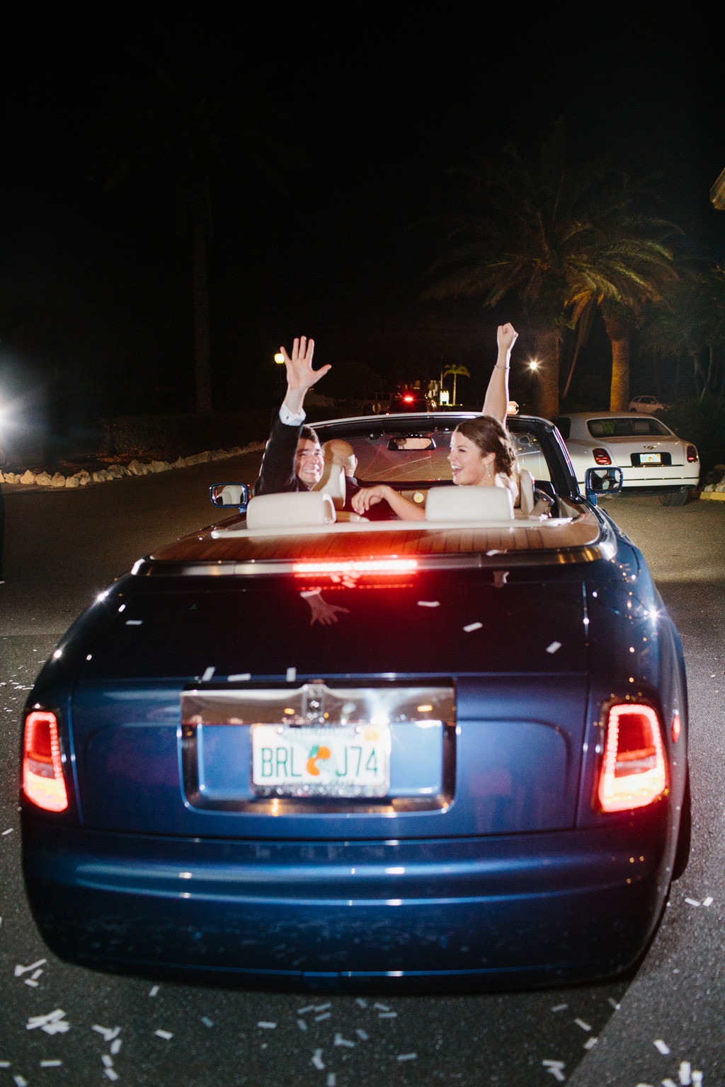 Tampa Bay Bride and Groom Wedding Exit in Blue Rolls Royce