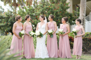 Florida Bride and Bridesmaids Outdoor Wedding Portrait, Bridesmaids in Mismatched Style Dusty Rose Dresses, Bride in Lace Fitted Sweetheart Neckline and Tank Top Strap Wedding Dress with White Cala Lily Floral Bouquets | Photographer LifeLong Photography Studios | Hair and Makeup Michele Renee the Studio