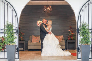 Florida Bride and Groom Wedding Portrait in Hotel Lobby | Tampa Bay Wedding Photographer Lifelong Photography Studios | St. Pete Beach Wedding Venue Hotel Zamora | Wedding Dress Shop Truly Forever Bridal
