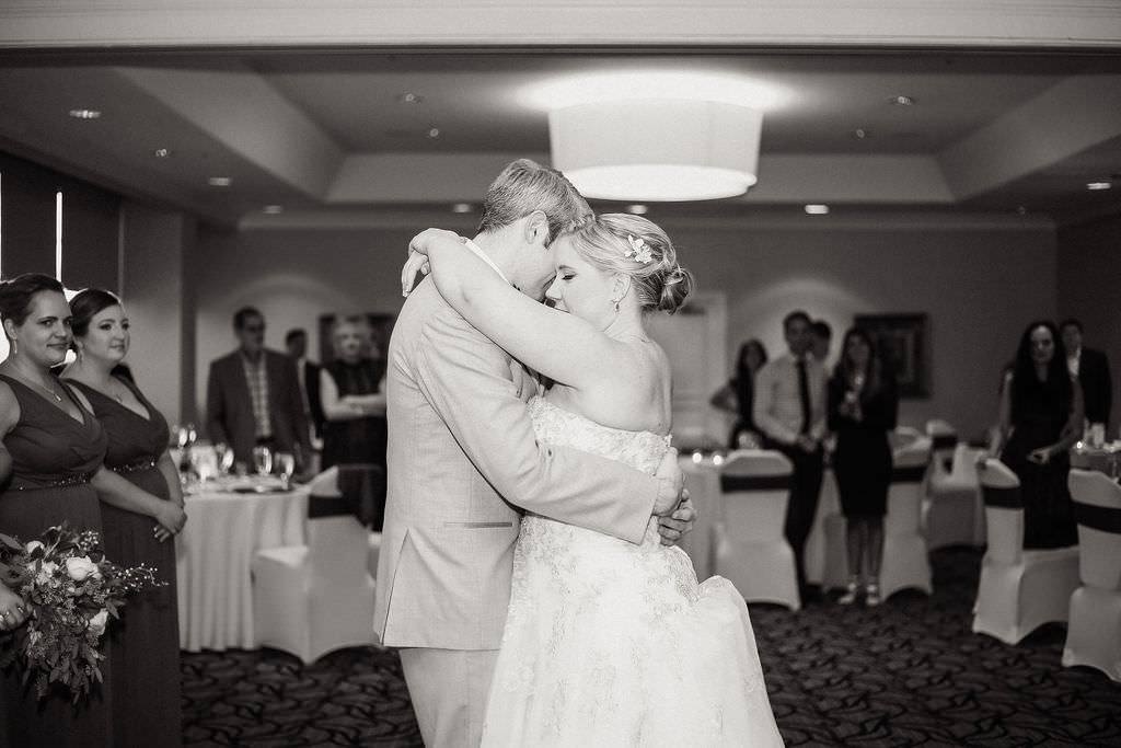 Florida Bride and Groom First Dance Black and White Reception Portrait, Bride in Strapless Wedding Dress and Groom in Tuxedo | Tampa Bay Wedding Venue Tampa Centre Club