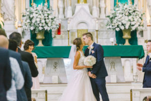 Tampa Bay Bride and Groom First Kiss Wedding Ceremony Portrait | Photographer Kera Photography | Traditional Wedding Ceremony Venue Sacred Heart Catholic Church