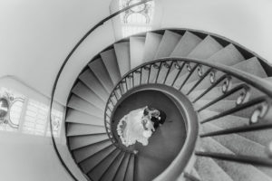 Black and White Bride and Groom Wedding Portrait on Swirl Staircase | Photographer Kera Photography | Tampa Bay Wedding Ceremony Venue Sacred Heart Catholic Church