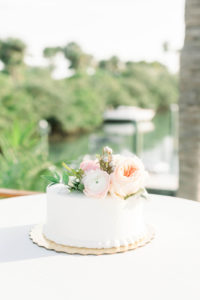 Simple, Elegant One Tier White Wedding Cake with Blush Pink and Coral Roses Cake Topper
