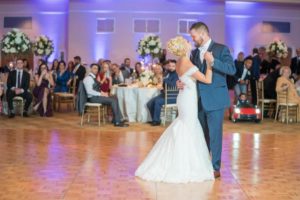 Florida Bride and Groom During First Dance at Wedding Reception, Bride in Pronovias White Lace Mermaid Style Wedding Dress with Off the Shoulder Lace Illusion Sleeves | Tampa Bay Wedding Venue Innisbrook Golf & Spa Resort