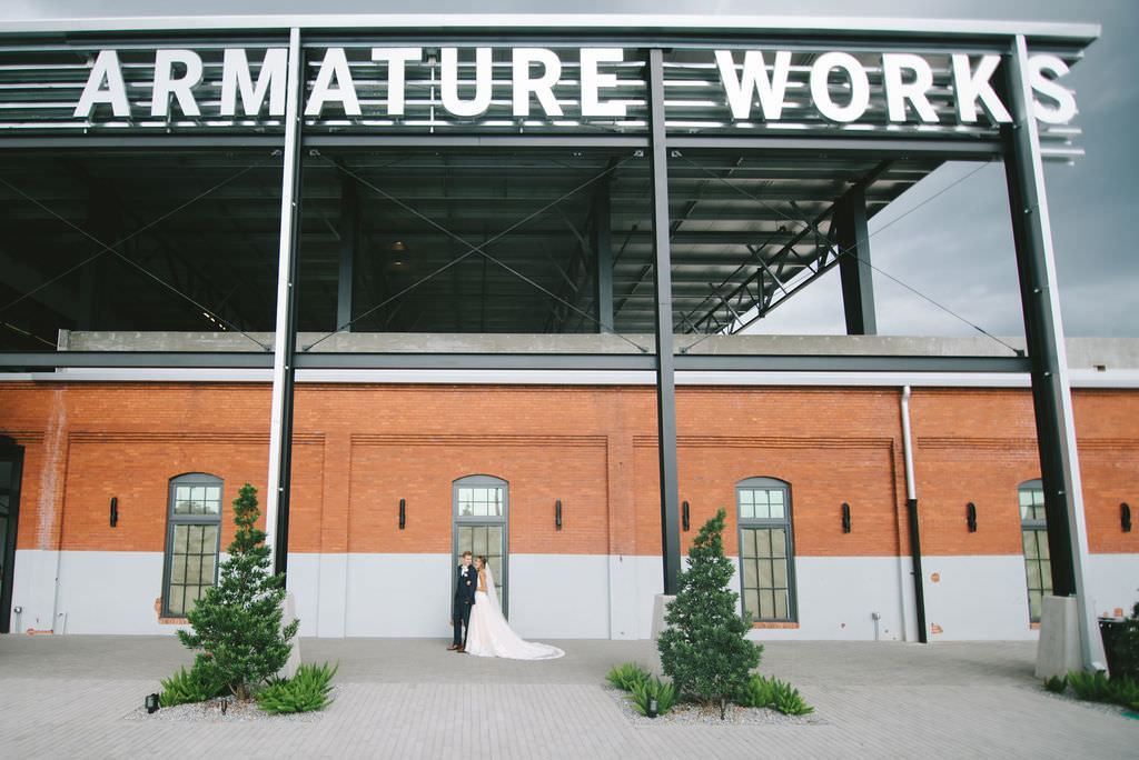 Florida Bride and Groom Wedding Portrait Outside Industrial Tampa Heights Wedding Venue Armature Works | Photographer Kera Photography
