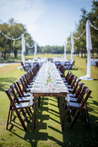 Rustic Southern Chic Garden Wedding Decor, Long Runner Table with Wooden Folding Chairs, Outdoor String Lights with Draping, Tampa Wedding Venue Palma Ceia Golf & Country Club | Tampa Bay Wedding Planner Jessie Soplinski with Breezin' Weddings