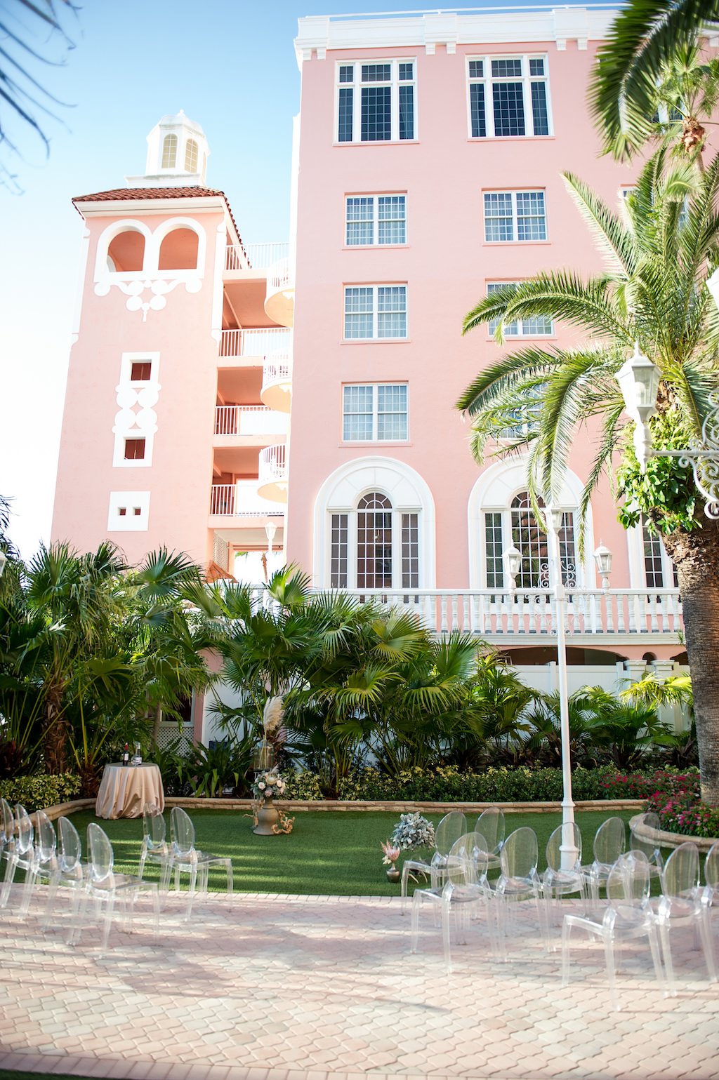 Chic Neutral Tone Modern Outdoor Ceremony with Ghost Acrylic Chairs | St. Pete Beach Resort Wedding Venue The Don Cesar | Tampa Bay Wedding Photographer Andi Diamond Photography| Tampa Wedding Rentals A Chair Affair | Tampa Bay Wedding Planner UNIQUE Weddings + Events