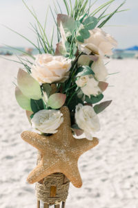 Rustic Beach Elegant Wedding Ceremony Decor, Blush and White Ivory Roses, Greenery Leaves, and Starfish | Clearwater Beach Wedding Planner Gulf Beach Weddings