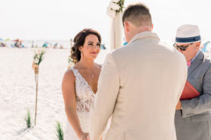 Clearwater Beach Bride and Groom Exchanging Vows During Beach Wedding Ceremony | Planner Gulf Beach Weddings
