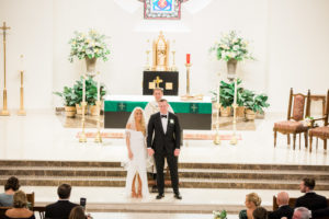 Traditional Bride and Groom Exchanging Vows During Wedding Ceremony | Tampa Bay Wedding Ceremony Venue Christ the King Catholic Church