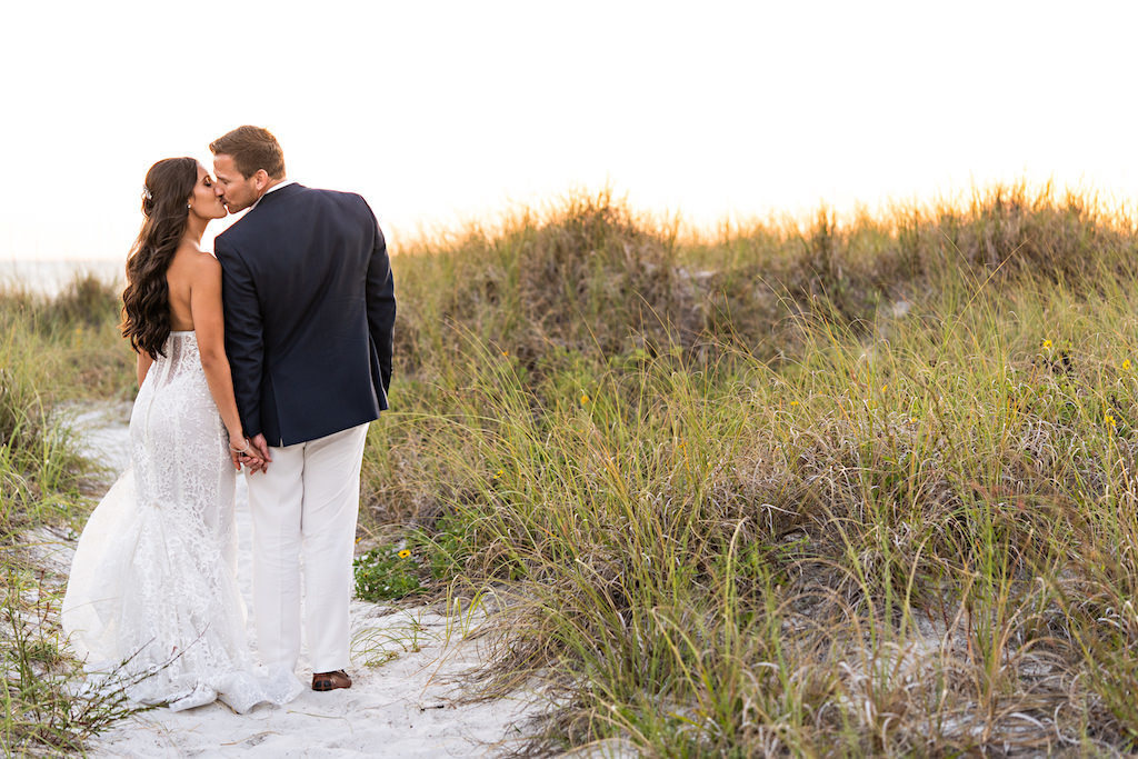 Florida Bride and Groom Intimate Wedding Portrait on Sand of St. Pete Beach Historic Don Cesar Hotel