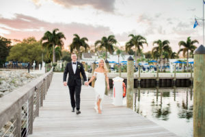Tampa Bay Florida Bride and Groom on Waterfront Boat Dock During Sunset | Wedding Venue Tampa Yacht and Country Club
