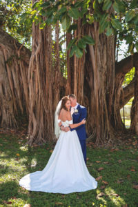 Florida Bride and Groom Golden Hour Wedding Portrait Under Giant Banyan Tree in Straub Park Downtown St. Pete