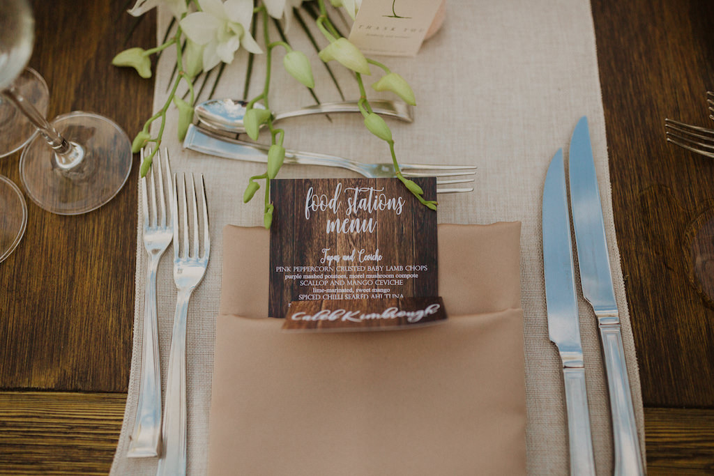 Boho, Organic Destination Florida Outdoor Waterfront Wedding Reception with Tropical Wedding Decor, Long Rectangle Wooden Tables with Burlap Runners with Wood Grain Menu in Tan Beige Napkin