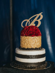 Modern Circus Inspired Two Tier Buttercream Wedding Cake with Red Floral and B Monogram Topper, Gold Textured, Black and White Stripes,