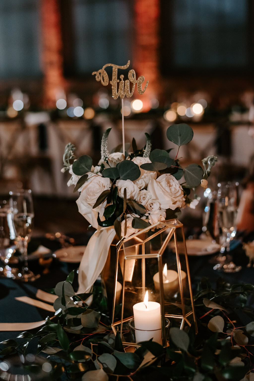 Modern, Geometric Industrial Gold Wedding Reception Decor, Low Floral Centerpiece, White, Ivory Roses with Greenery with Gold Glitter Table Number, Gold Geometric Candle Holder