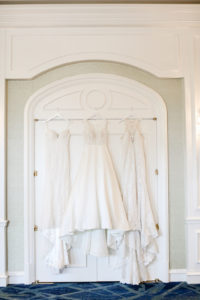Three Hanging White Long Wedding Dresses | Truly Forever Bridal | Tampa Bay Wedding Photographer Lifelong Photography Studios