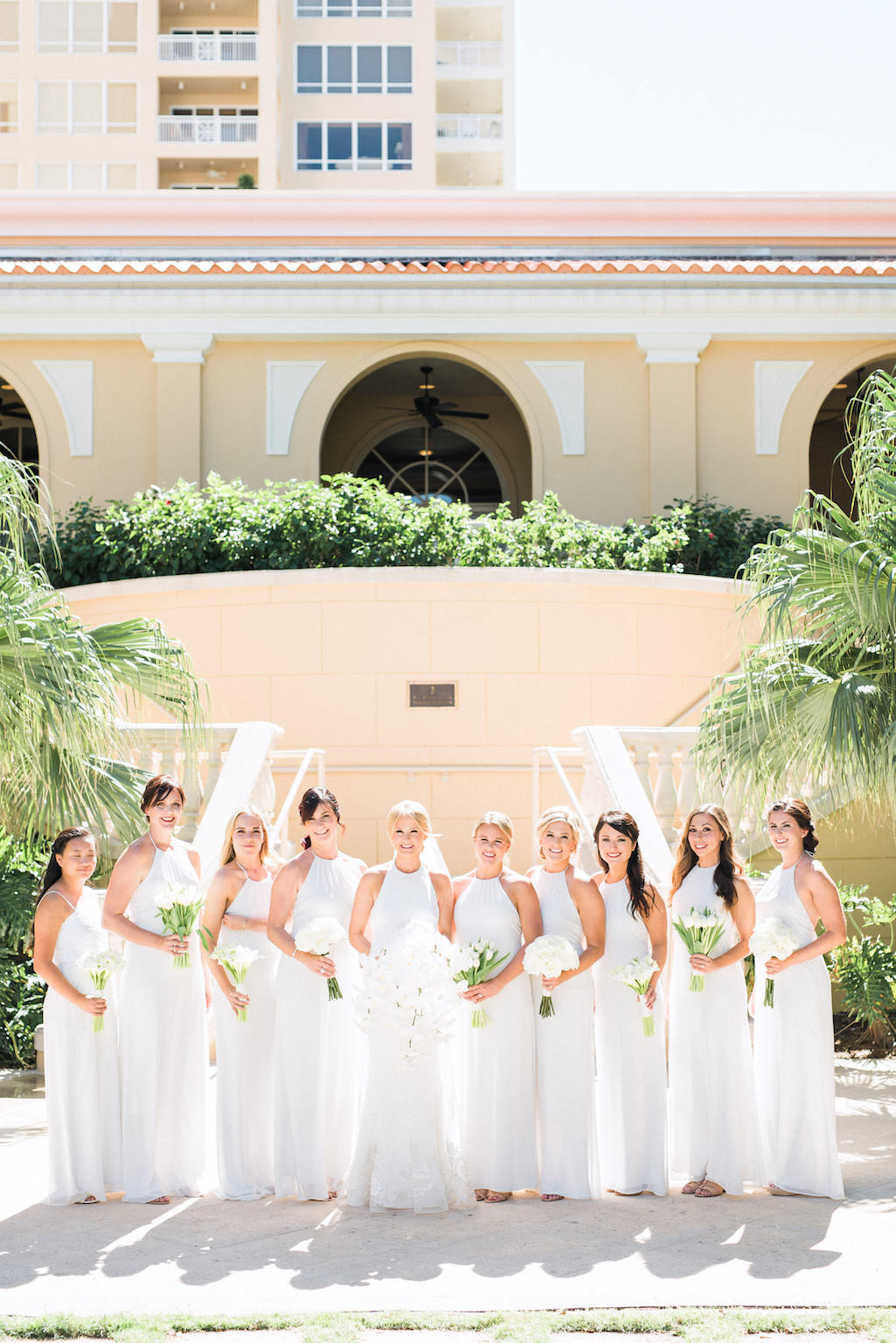 Florida Bride and Bridesmaids in Matching Classic, White, Bateau Neckline, Long Dresses, Carrying Clean, Garden Inspired Wedding Bouquets, The Ritz Carlton Sarasota