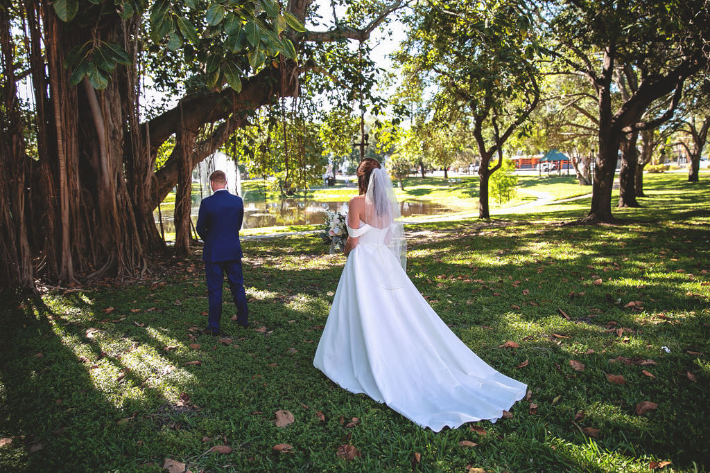 Florida Bride and Groom First Look under Giant Tree in Straub Park, Downtown St. Pete