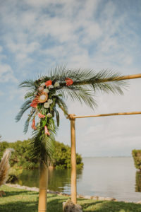 Tropical Destination Florida Outdoor Wedding Decor, Bamboo Wedding Arch, Blush Pink and White Flowers, Pink Ginger, King Proteas, Orchids, with Palm Leaf Greenery | Sarasota Waterfront Wedding Venue Longboat Key Club